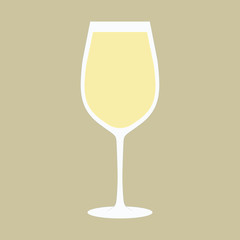 Glass with white wine on a beige background