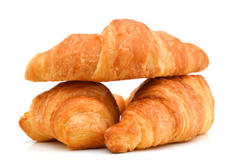 Fresh and tasty croissant over white background