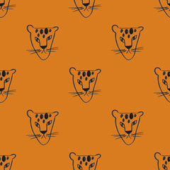 Seamless pattern with cheetah faces.