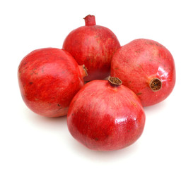 Fototapeta premium Ripe pomegranates on white