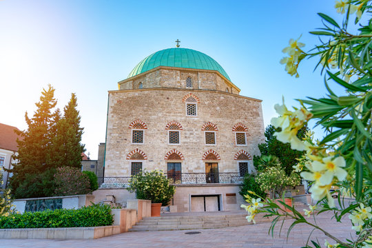 dzsami mosque on the main square in Pecs Hungary with flowers