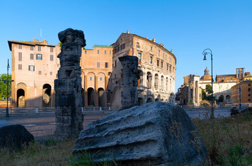 View of colossal Roman ruins with the theater of Marcello, ruins of the temple of Apollo in the Campo Marzio area known as Circo Flaminio between the Tiber river and the Capitoline Hill. Rome Italy.