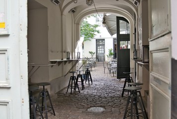 A fashionable cafe area in the back of the alley