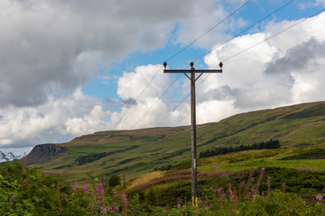 Fototapeta na wymiar Electric Pylon in the Scottish Highlands