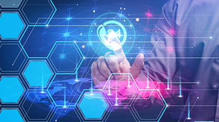 Fototapeta premium Business, Technology, Internet and network concept. Young businessman working on a virtual screen of the future and sees the inscription: