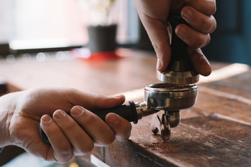 making coffee on a wood table