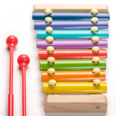 Color xylophone on white background. Colour xylophone. Rainbow  Colorful musical instrument for...