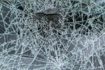 Cracks on the glass, a lot of small fragments
