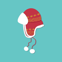 red ushanka hat with hand-drawn yellow ornament white bells on red strings on a blue background