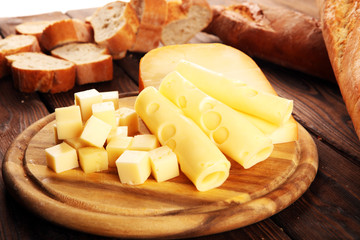 Different sorts of cheese. Cheese platter with different cheese and spice