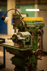 vintage lathe at the factory, turning production