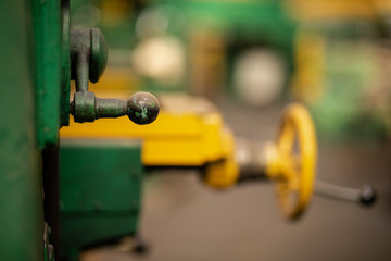 vintage lathe at the factory, turning production