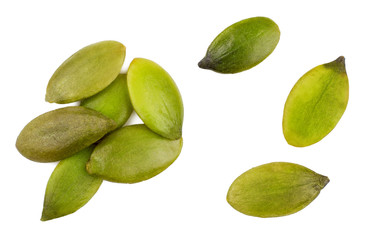 Pumpkin seeds isolated on white, top view.