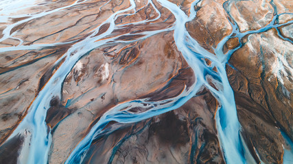 A glacial rivers from above. Aerial photograph of the river streams from Icelandic glaciers....