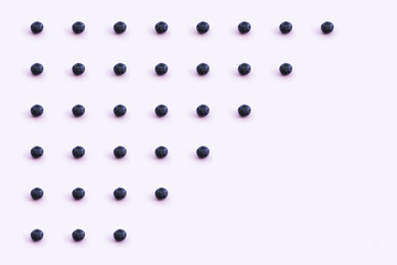 Blueberry pattern of the straight lines on the pink background