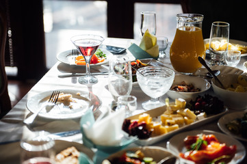 catering services background with snacks and glasses of wine on bartender counter in restaurant