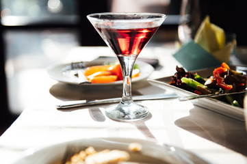 catering services background with snacks and glasses of wine on bartender counter in restaurant