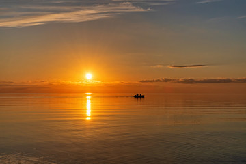 Fototapeta na wymiar Sunset on the lake in summer, Pskov region 