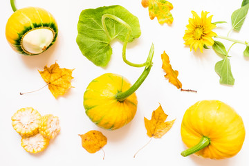 Autumn background with yellow leaves and vegetables. top view and flat lay