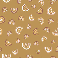 Rainbows seamless vector pattern. Childish seamless background in earthy colors gold pink rose white. Hand drawn rainbows. Trendy kids vector background.