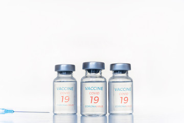 Transparent vials, syringe with new vaccine for covid-19 coronavirus, flu, infectious diseases. Injection after clinical trials for vaccination of human, child, adult, senior. Medicine, drug concept