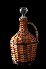 Bottle braided on black background