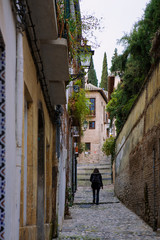 Fototapeta na wymiar Calle Gumiel de San Pedro, El Albaicín, Granada, Spain: a quiet backstreet in the old Moorish quarter