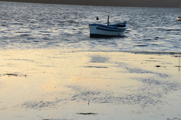 Naklejka premium fishing boat in marceddi, sardinia, italy