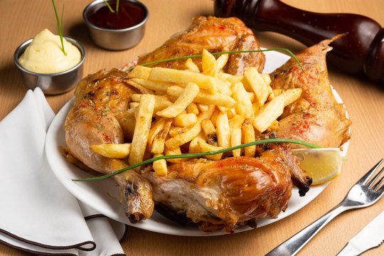 pollo con papas fritas