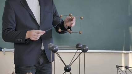 Teacher Or Student With Molecular Model In Classroom. Chemistry Lesson 