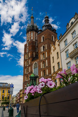 Naklejka premium St. Mary's Church with flowers, Cracow, Poland