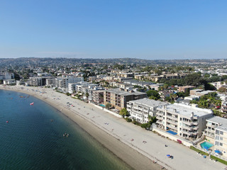 Fototapeta na wymiar Aerial view of Mission Bay and beaches in San Diego, California. USA. Community built on a sandbar with villas and recreational Mission Bay Park. Californian beach-lifestyle.