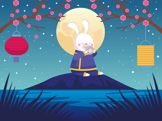 mid autumn celebration card with rabbit and fullmoon scene