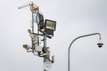 Multiple outdoor CCTV security cameras attached the light pole