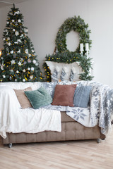 Stylish modern christmas decor of a small cozy room