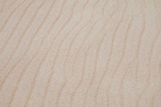 Sand Tekstur. Brunt sand. Baggrund fra fint sand. Sand baggrund