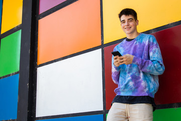 teenage boy with mobile phone