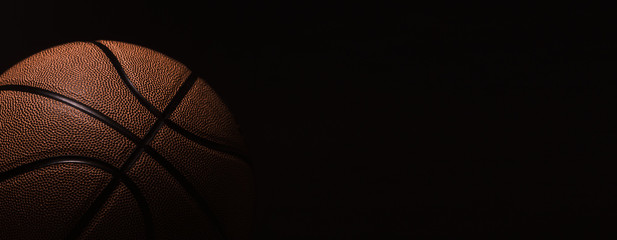 Closeup detail of basketball ball texture background. Team sport concept.  Sports modern banner