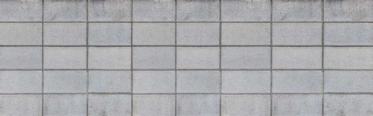 Panorama of White stone block wall seamless background and pattern texture