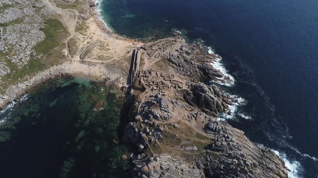 Celtic settlement of Castro de Baro&ntilde;a. Beach of Porto do Son, A Coru&ntilde;a. Galicia, Spain. Aerial Drone Footage