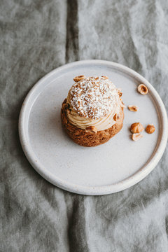 Isolate paris brest french pastry cake concfectioner on a ceramic plate