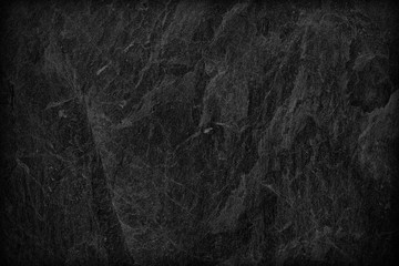 Dark grey black slate background or texture.