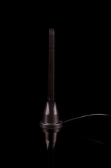 Monopole antenna for IoT and 5G isolated on the black background