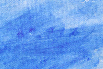 Blue watercolor on art paper background.