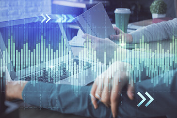 Double exposure of man and woman working together and forex chart hologram. Business concept. Computer background.