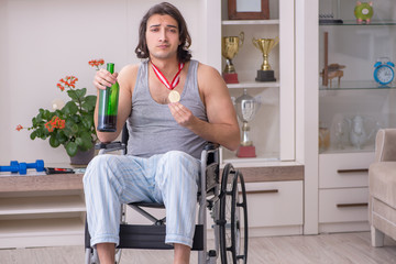 Man ex-champion in wheel-chair suffering from alcoholism