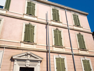 typical early 20th century building facade in Antibes French Riviera