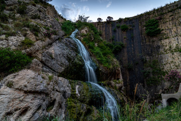 waterfall in the reservoir of tibi dam in alicante