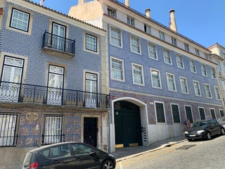 Square with typical beautiful blue building with azulejos, Lisbon center, campo de ourique, Portugal