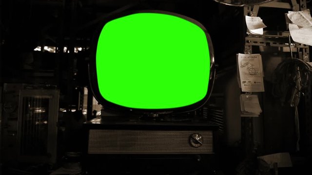 Vintage Round Television with Green Screen. You can replace green screen with the footage or picture you want. You can do it with “Keying” effect in After Effects. Sepia Tone.